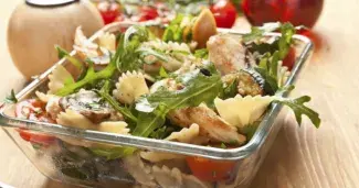 Lamb's lettuce, pasta and chicken salad