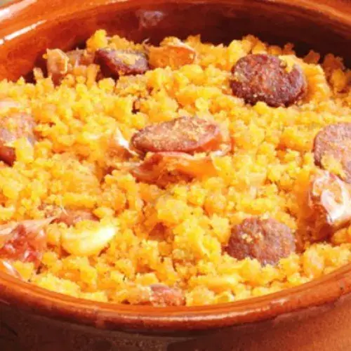 Migas with chorizo and egg flowers
